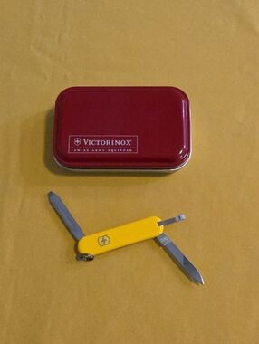 Yellow Swiss Army 55 MM Knife Keychain with Red Metal Tin - Marked Atlantic CAT